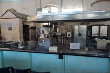Glass Blowing Demonstration area at Dockyard Glassworks Bermuda.jpg