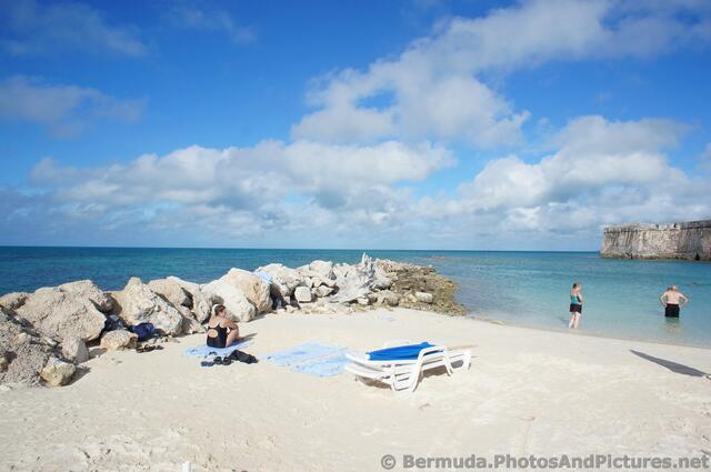 Rocks form a wall at Snorkel Park Beach.jpg