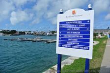 Sign for Transportation Zones Ferriers & Buses to Beaches near Royal Naval Dockyard Bermuda.jpg