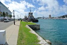 Tug Boat Faithful & Royal Caribbean Explorer of the Seas docked at Bermuda.jpg