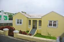 Yellow Bermuda home near Ely's Harbour.jpg