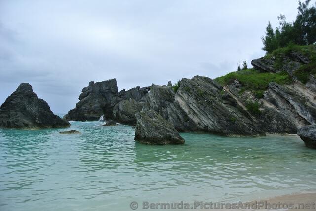 Rocks and water and Horseshoe Bay Cove.jpg