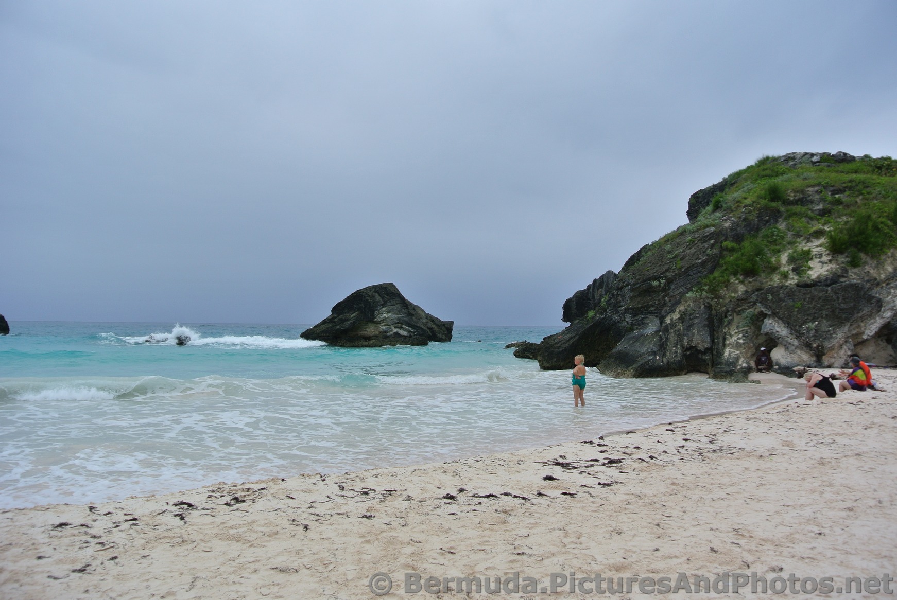 Vacationers in waters at Horseshoe Bay Beach.jpg
