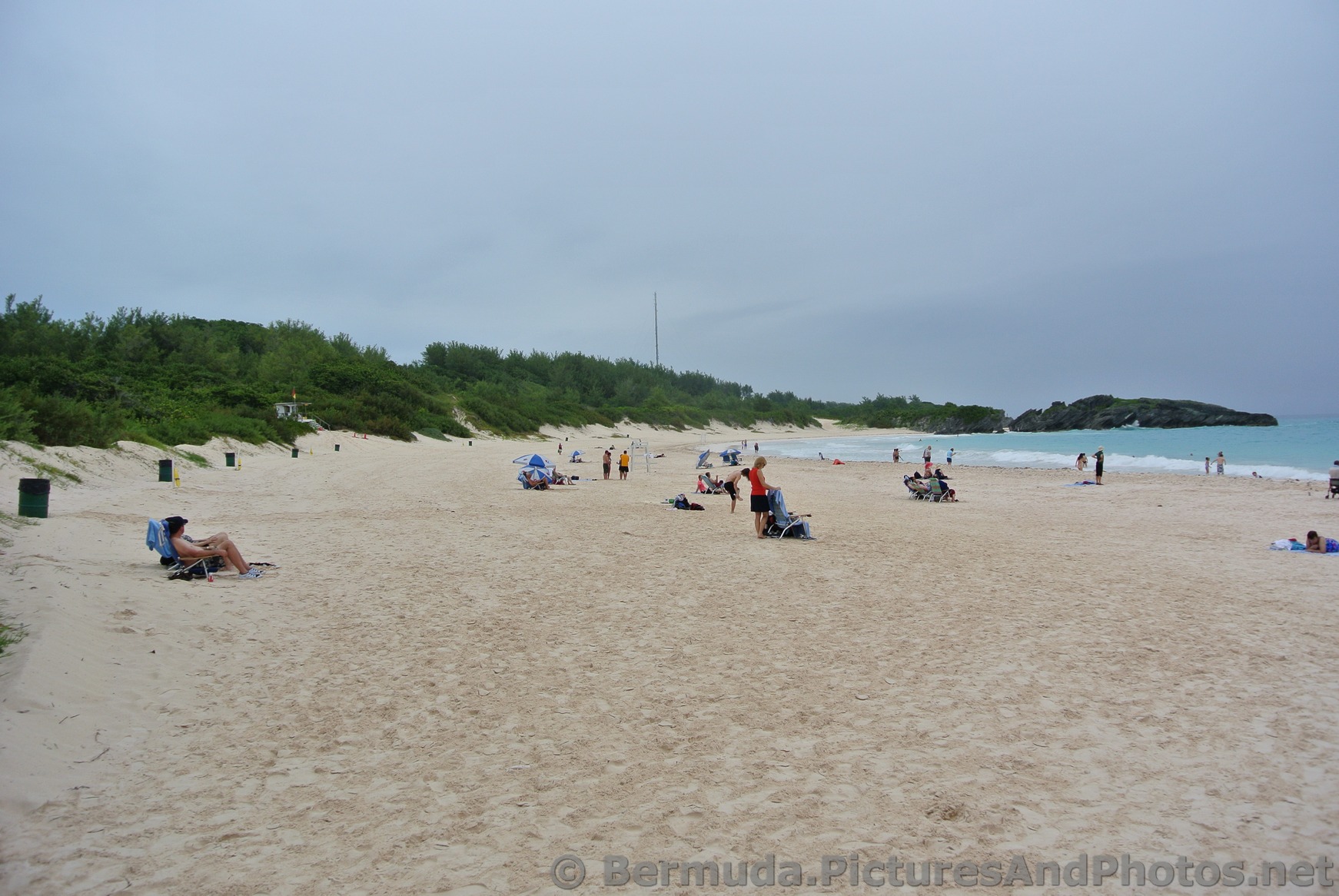 People in beach chairs at Horseshoe Bay Beach.jpg