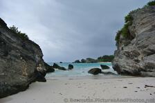 View of Horseshoe Bay Beach from between 2 rocks at Butts Beach.jpg