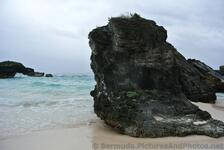 Giant black rock at Middle Beach Bermuda.jpg