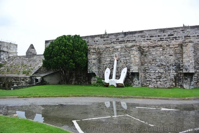 Anchor lays against wall of Royal Naval Dockyard Bermuda.jpg