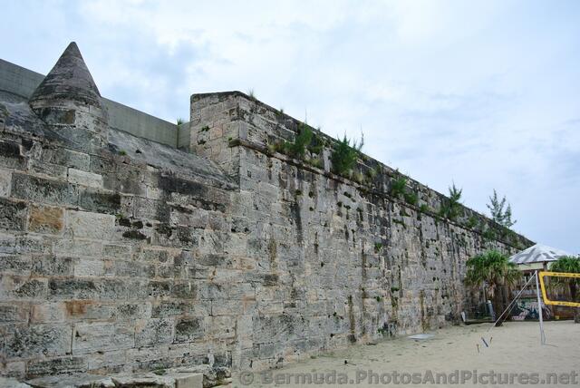 Dockyard wall bordering Snorkel Park Beach.jpg