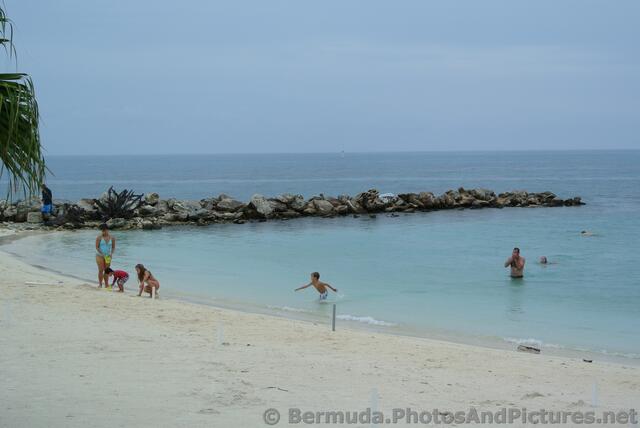 Kids playing in the waters at Snorkel Park Beach Bermuda.jpg