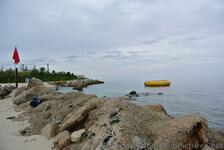 Rocks at edge of Snorkel Park Beach.jpg