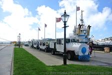 Bermuda Complimentary Train-like Tram Shuttle takes passengers from Cruise dock to Naval Dockyard & Clock Tower Mall.jpg