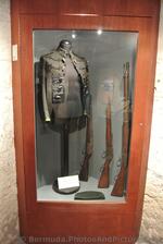 Early 1900s BVRC Offer's Tunic & Forage Cap on display Commissioner's House Bermuda Maritime Museum.jpg