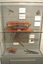 Ship Model & Tools used to construct Dockyard on display at High Cave Bermuda Maritime Museum.jpg