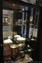Plates Cups Utensils Pitchers from early Bermuda cruise ships Commsioner's House Bermuda Maritime Museum.jpg