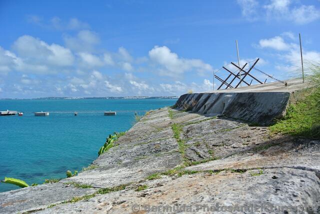 Fortified wall with view of ocean from Bermuda Royal Navy Dockyard.jpg