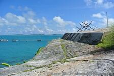 Fortified wall with view of ocean from Bermuda Royal Navy Dockyard.jpg