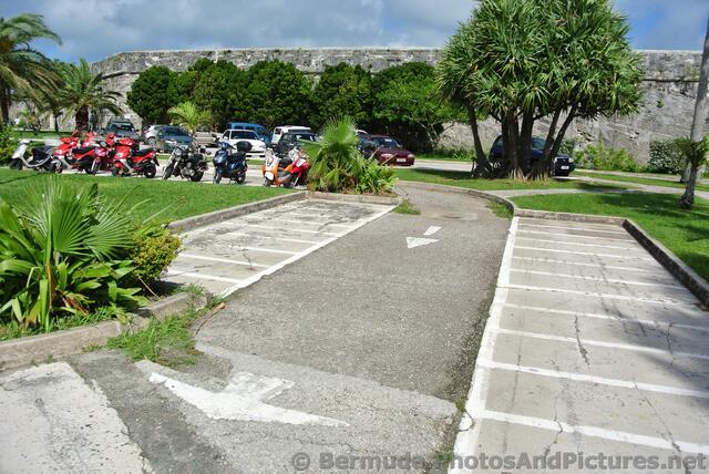 Motorcycles in parking lot of Bermuda Royal Naval Dockyard.jpg