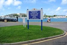 Signs posted at cruise ship docking area for Royal Naval Dockyard.jpg